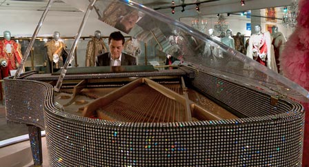 Michael plays one of Liberace’s rhinestone encrusted pianos in the now-closed Liberace Museum in Las Vegas. Liberace used to travel with his own glazier who was responsible for re-gluing all the rhinestones on his pianos and cars that were damaged in transport.