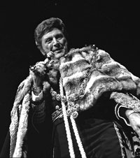 Liberace performing in Las Vegas in one of his trademark over-the-top costumes, circa 1970s.