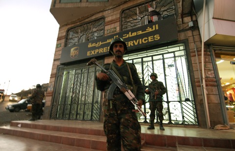 Yemeni security outside UPS branch