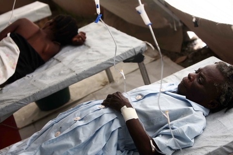 Cholera victims in Haiti. Photo by Hector Retamal, Getty Images