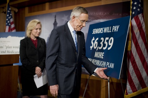 Sens. Kirsten Gillibrand, D-N.Y., and Harry Reid, D-Nev. Photo by Tom Williams/Roll Call