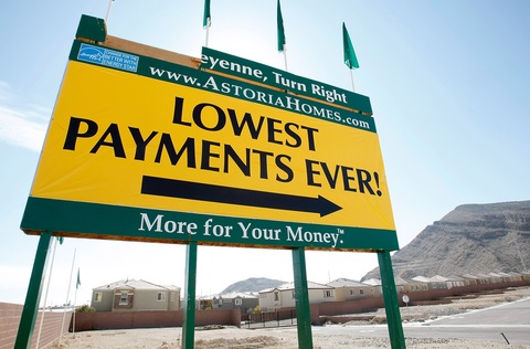 A sign at a new housing development advertises low payments