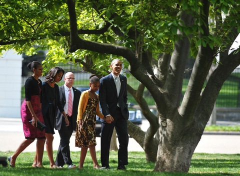 President Obama and the first family; photo by Mandel Ngan/AFP/Getty Images