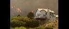 PBS NewsHour | Thousands Flee After Colorado Fire Doubles in Size | PBS